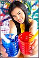 Thai Girls Holding Paint Pots Smiling Broadly