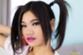 Bunni raising arm hair in pigtails