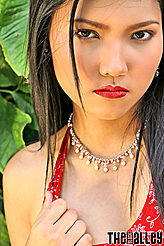 Long Black Hair Intense Look Playing With Red Dress