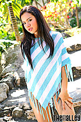 Jasmine Wang Wearing Striped Poncho